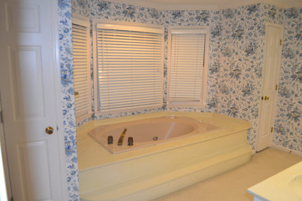 The master bath is very spacious (except for the shower) and there's a bay window alcove where the tub is.