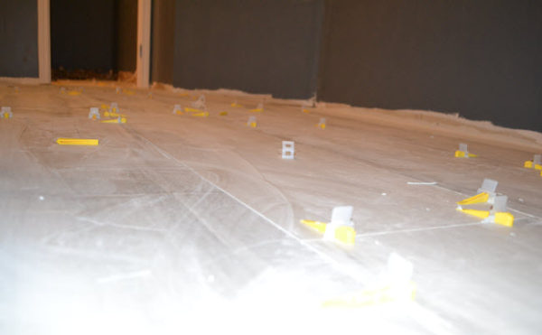 For large tile installations (anything tile bigger than 16x16), make sure your installer uses a leveling system.