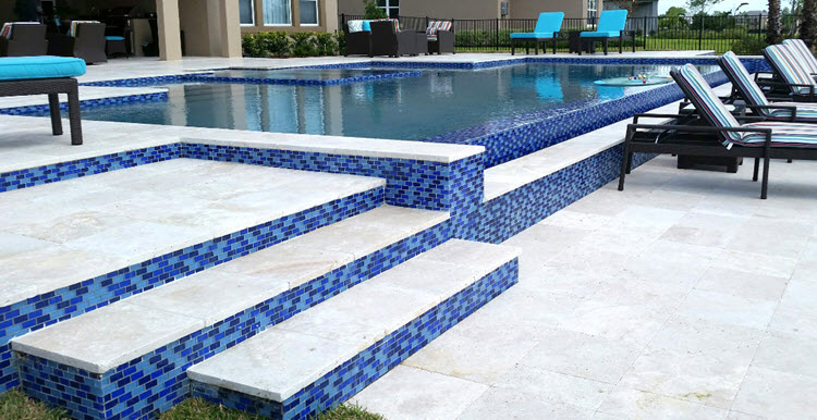 1x2 mosaics used to outline the steps and exterior walls of the pool.